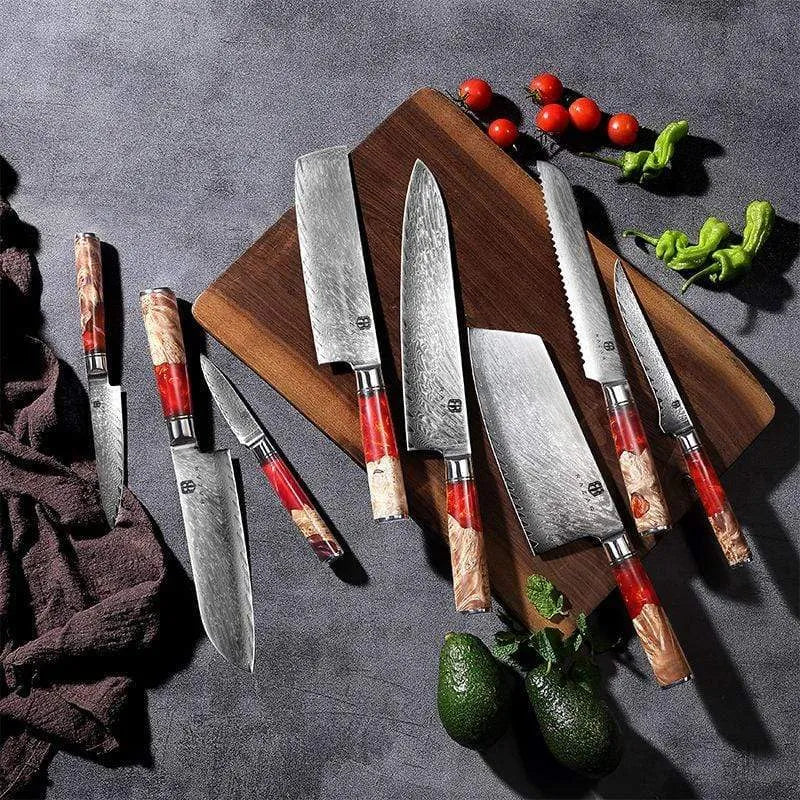 Damascus chef's knife with unique epoxy resin handle and Three German steel blade on cutting board