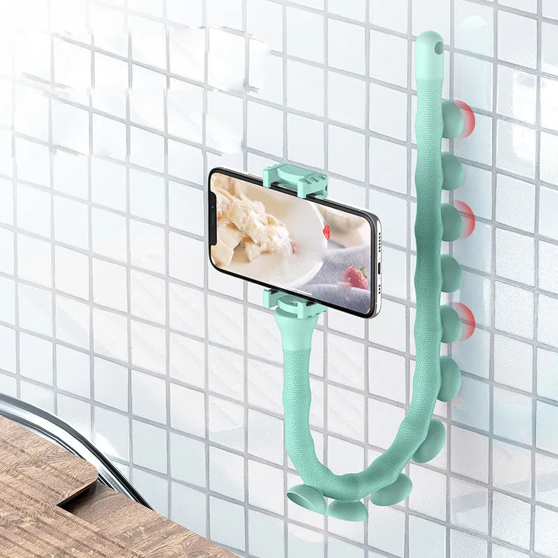 Black flexible worm arm phone holder with suction cup extended, showing 360-degree rotating bracket.