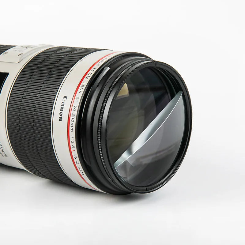 77mm half moon mirror camera filter for creative split-focus photography on a lens.