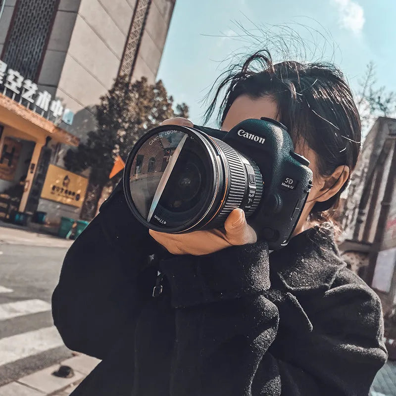 77mm half moon mirror camera filter for creative split-focus photography on a lens.