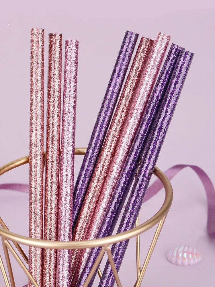 Mixed colour HB graphite pencils in a display box with poplar wood barrels, including purple glitter and pale pink colours.