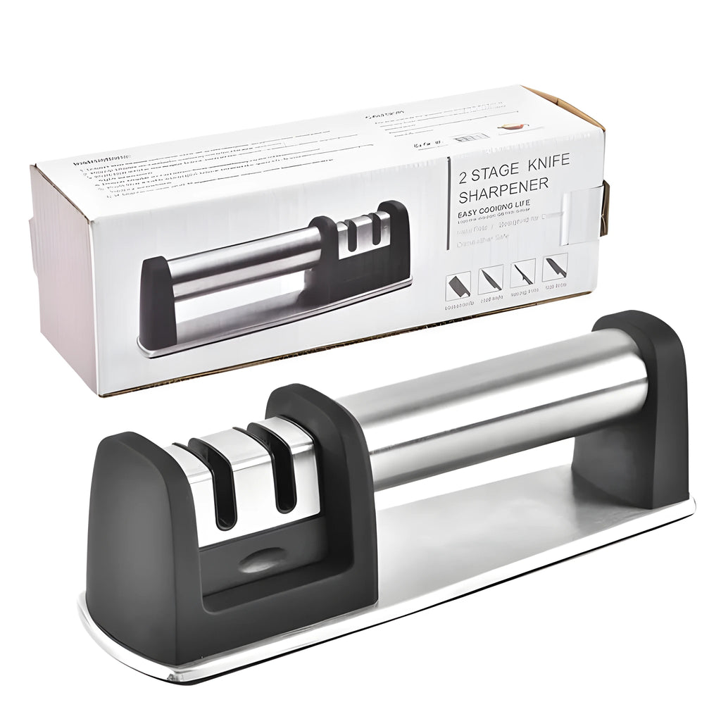 New kitchen sharpener made of black ABS plastic on a surface, manual knife sharpening tool