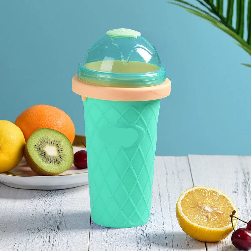 Smoothie cup with quick freezing technology in new mint green, 21cm tall, with lid and straw spoon