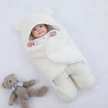 Baby quilted sleeping bag wrapper in cotton blend fabric with polyester cotton filling, shown in one of six colours