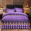 Polar fleece lace bedskirt set in navy blue with matching pillowcases on a double bed