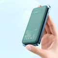 Maiduo MagSafe magnetic wireless power bank in mint green colour showing dimensions 15.5cm × 7.5cm