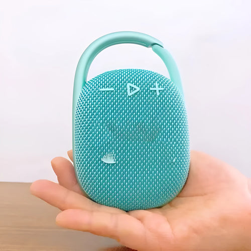 Mini portable Bluetooth speaker in one of six colours: black, blue, green, pink, red, or silver grey.