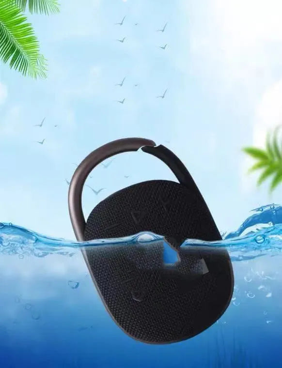 Mini portable Bluetooth speaker in one of six colours: black, blue, green, pink, red, or silver grey.