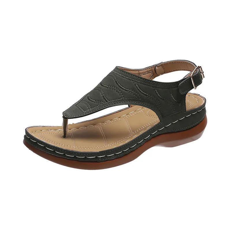 Women's casual wedge heel sandals in black with an adjustable back strap buckle.