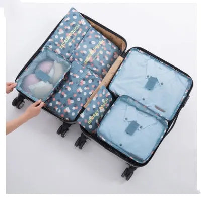 Waterproof nylon packing cube set with six bags in 8 colours for travel organisation