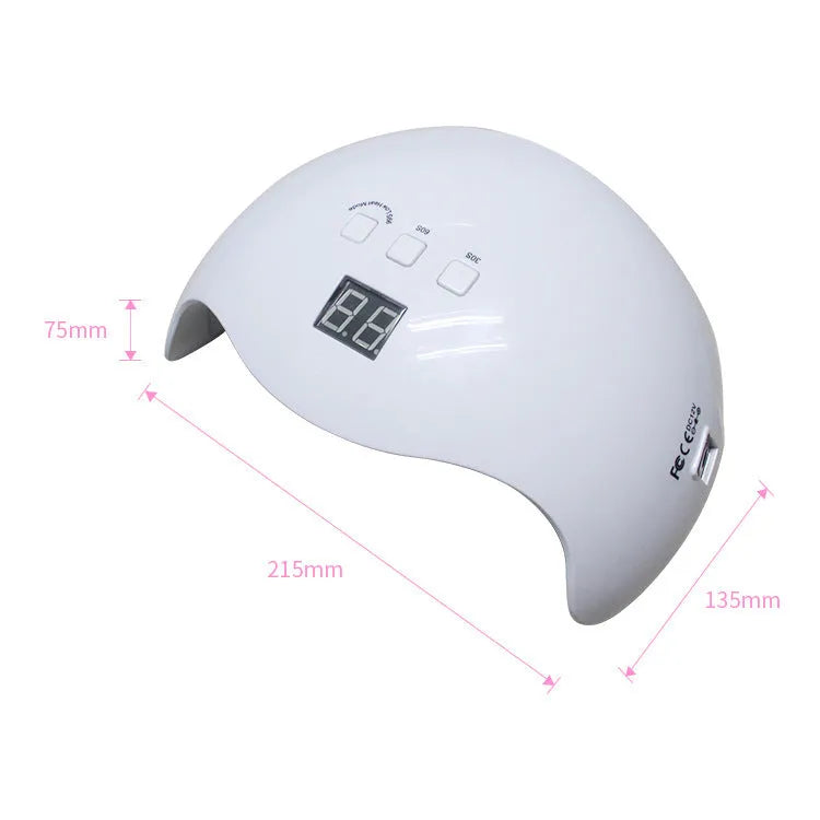 White SUN X9Plus nail phototherapy LED lamp with 21 beads and induction sensor on a desk