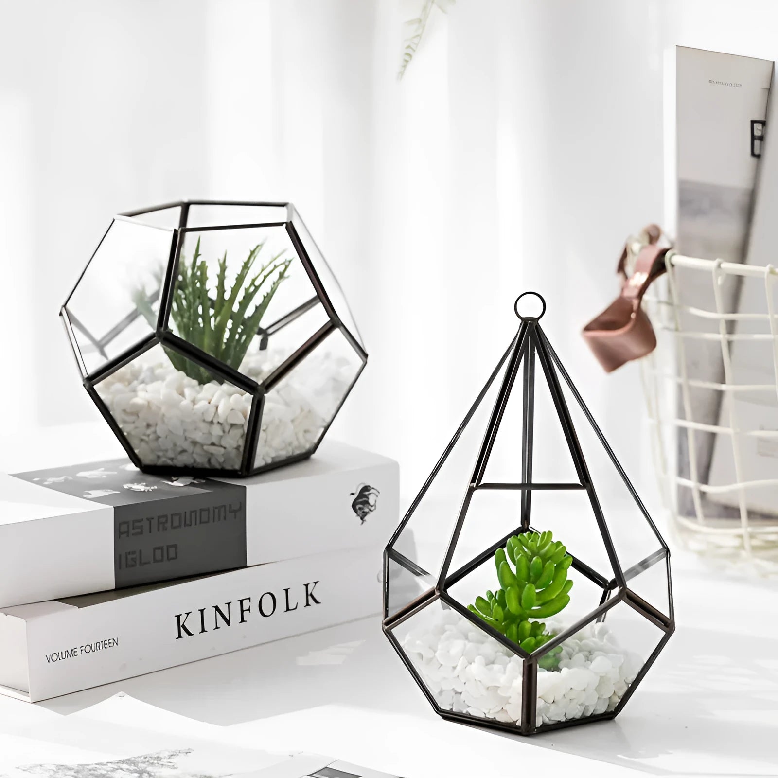 Metal and glass succulent decoration in Golden Love style on a living room table
