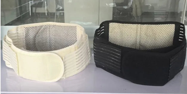 Black self-heating magnetic waist protection belt for lumbar support shown on a size chart.