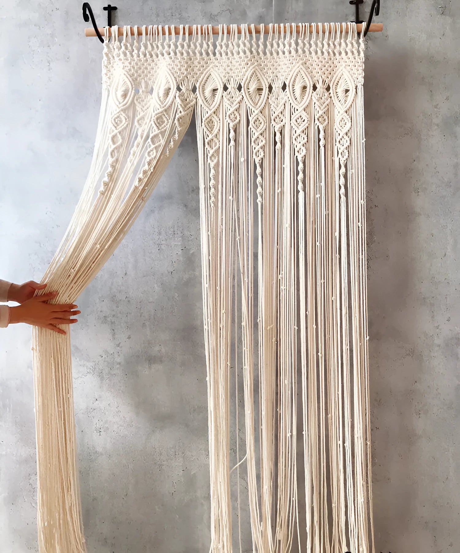 Perforated Nordic woven tassel partition curtain in white for doorway light shading