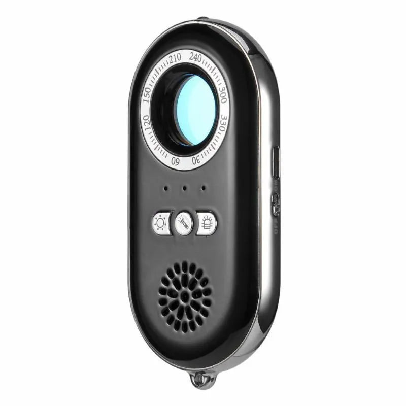 Compact black wireless vibration alarm detector for travel security placed on a door