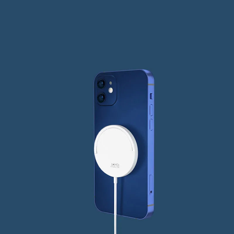 Black mobile phone magnetic bracket wireless charger with Type-C input on a desk