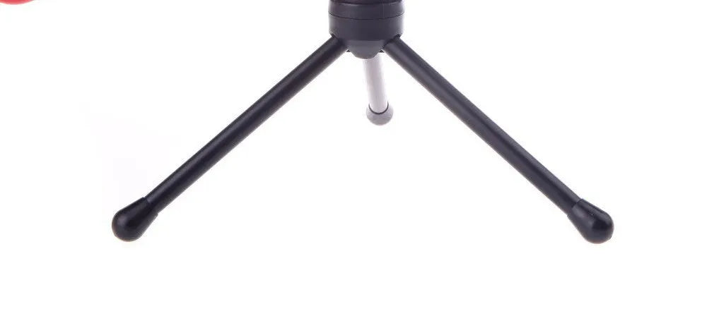 Black wired computer microphone with a clip holder and long cable for chatting or karaoke.
