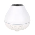 Round white Bluetooth humidifier and aroma diffuser with water tank and control buttons