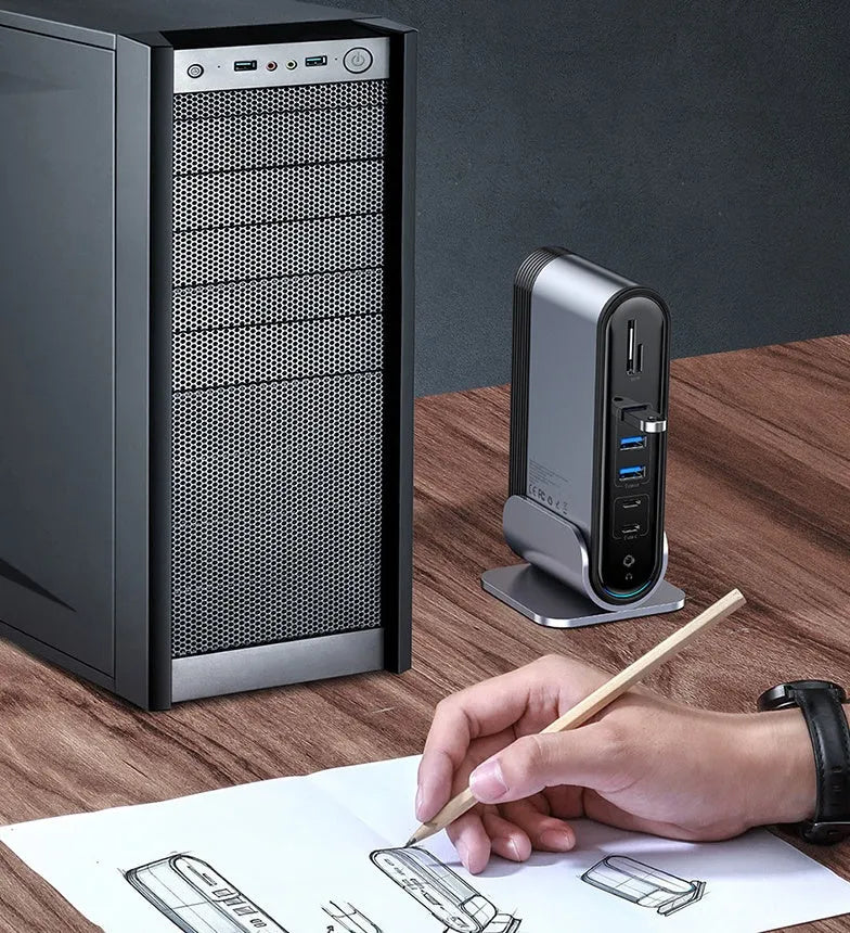 Deep space grey 16-in-1 Type-C docking station hub with multiple ports on a desk.