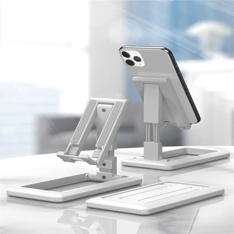 Retractable folding mobile phone desktop stand in black on a desk