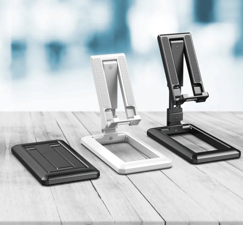 Retractable folding mobile phone desktop stand in black on a desk