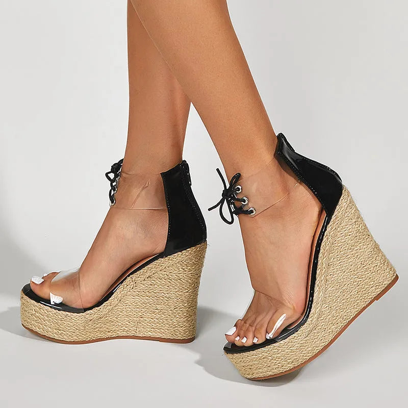 Black women's wedge sandals with hemp rope detailing on platform heel and front tie closure