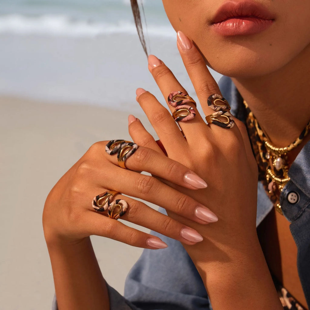 Open mouth stainless steel ring with geometric heart design and leopard print pattern