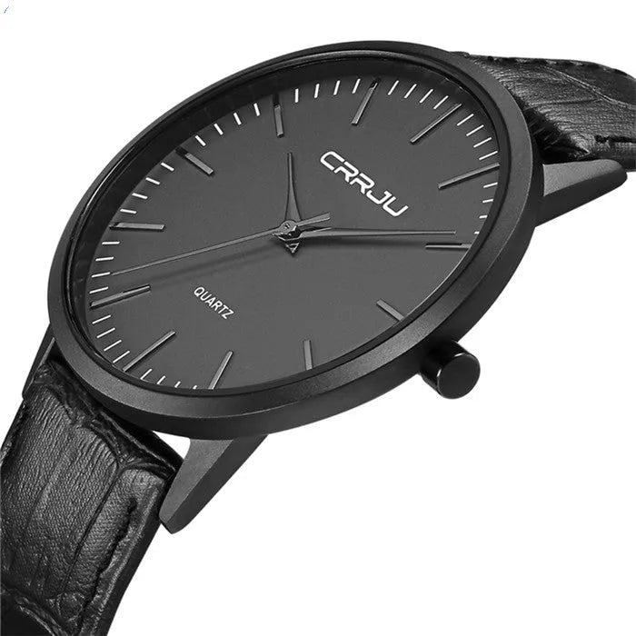 Casual quartz watch with alloy case and black mesh strap on a wrist.