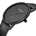 Casual quartz watch with alloy case and black mesh strap on a wrist.