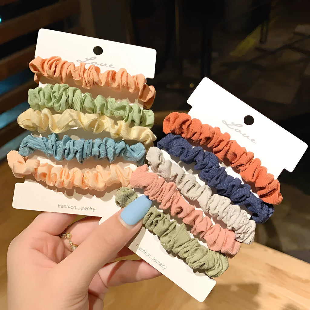 Children's 20-piece hair accessory set showing small intestine hair ring and large intestine head rope styles in autumn colours