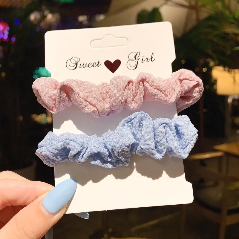 Children's 20-piece hair accessory set showing small intestine hair ring and large intestine head rope styles in autumn colours