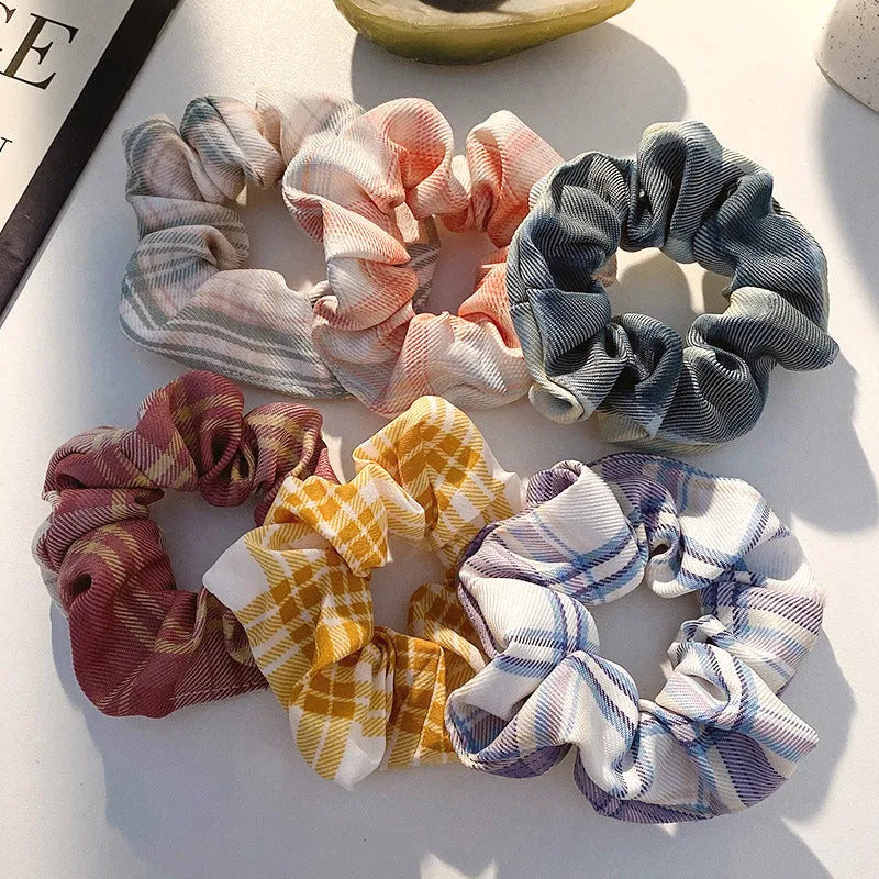 Children's 20-piece hair accessory set showing small intestine hair ring and large intestine head rope styles in autumn colours