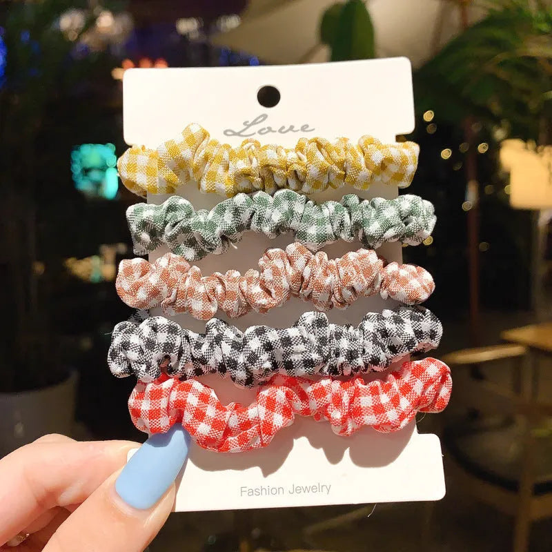 Children's 20-piece hair accessory set showing small intestine hair ring and large intestine head rope styles in autumn colours