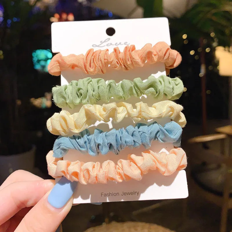 Children's 20-piece hair accessory set showing small intestine hair ring and large intestine head rope styles in autumn colours