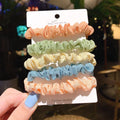 Children's 20-piece hair accessory set showing small intestine hair ring and large intestine head rope styles in autumn colours