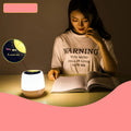 Pruixin rotating projector night light showing star pattern projection on a bedroom ceiling.