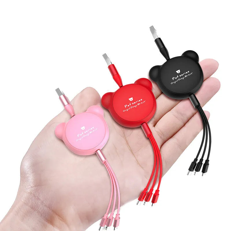 Cute telescopic bear data cable with three connectors in pink on white background