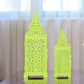 Pair of blue geometric iron Moroccan candlesticks with hollow design for tealights.