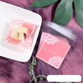 Pink self-adhesive plastic packaging bag with gusset for handmade soap and snacks