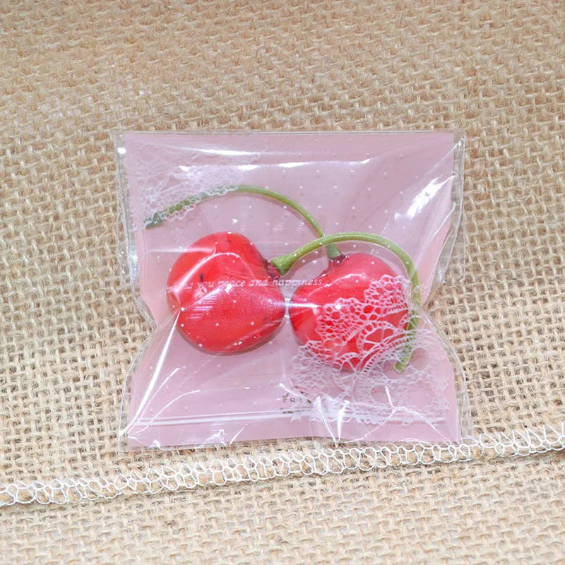 Pink self-adhesive plastic packaging bag with gusset for handmade soap and snacks