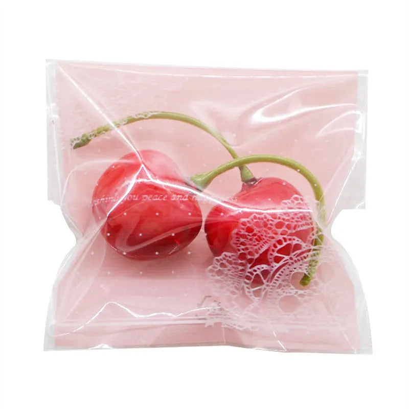 Pink self-adhesive plastic packaging bag with gusset for handmade soap and snacks