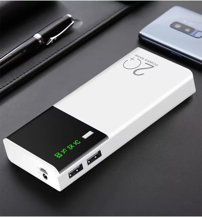 Black 20000mAh portable power bank with USB charging cable, showing compact size.