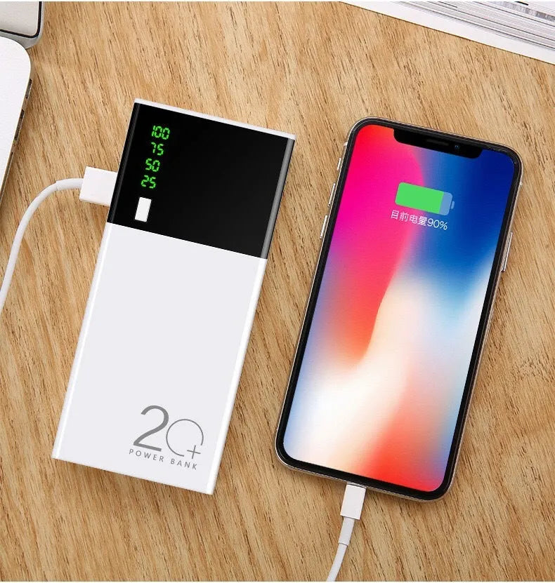 Black 20000mAh portable power bank with USB charging cable, showing compact size.
