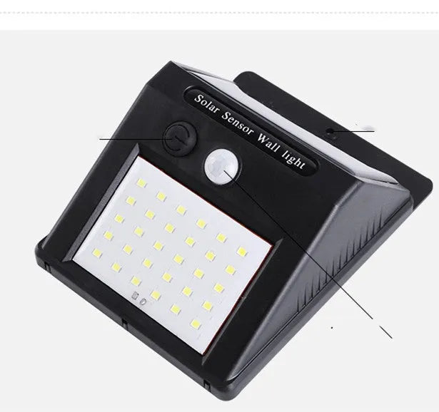 Solar outdoor garden lamp with motion sensor and LED bulbs for automatic night lighting