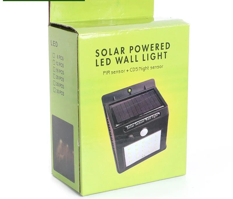 Solar outdoor garden lamp with motion sensor and LED bulbs for automatic night lighting