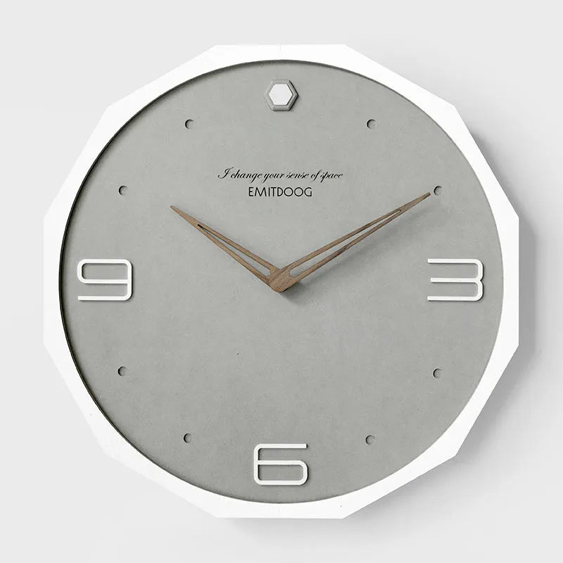 Round 12 inch Nordic minimalist wall clock in Geralt material showing four colour options