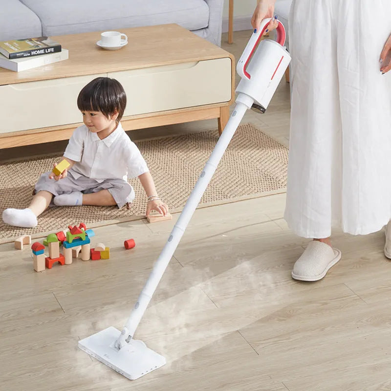 Deerma DEM-ZQ610 multi function steam cleaner with white body, five brush heads, and glass scraper on a light background