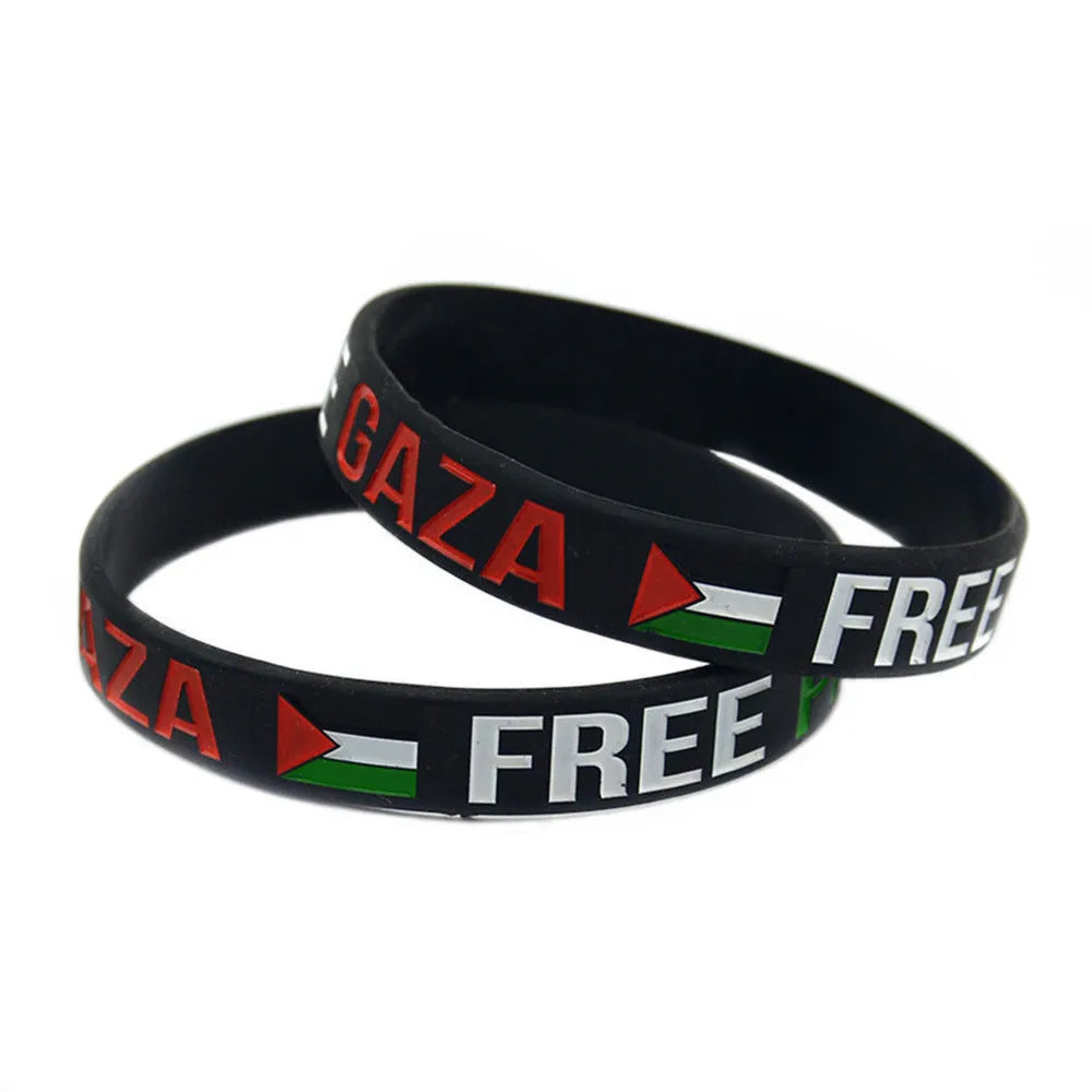 Palestine flag silicone wristband set with black and white bands on display