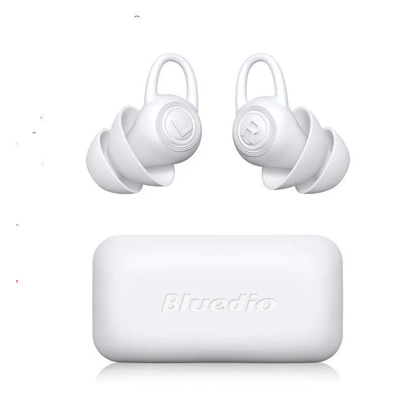 A single pair of white soft silicone ear plugs on a clean background, shown beside their independent packaging.