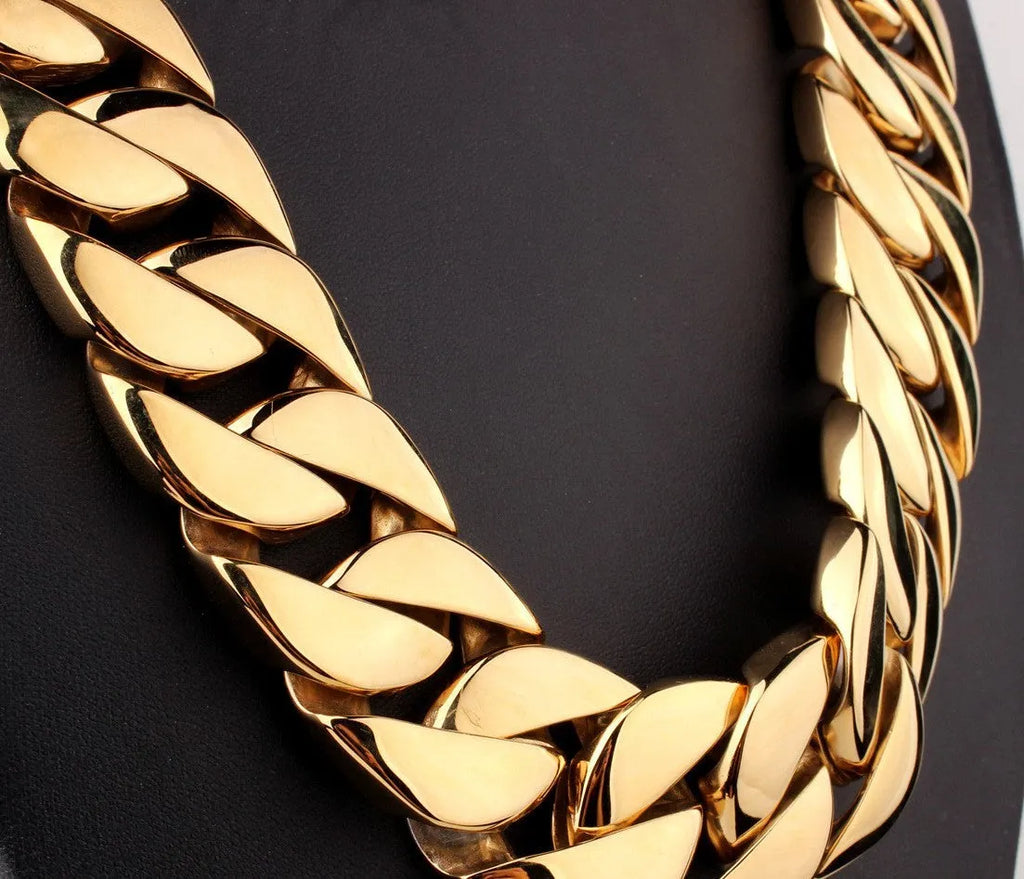 Men's gold titanium steel vacuum plating casting necklace with geometric whip chain design on white background